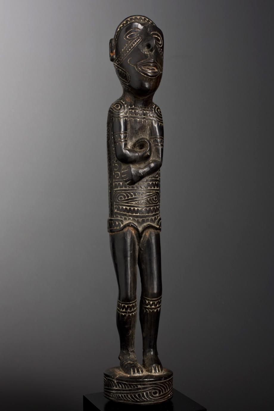 A Fine Old Massim Ancestor Figure by Mutuaga Milne Bay Province Papua New Guinea