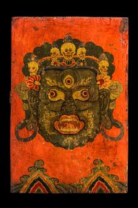 A Superb Pair of Buddhist Ritual Cabinet Doors with Face of Mahakala Tibet