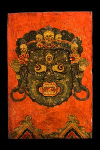 A Superb Pair of Buddhist Ritual Cabinet Doors with Face of Mahakala Tibet