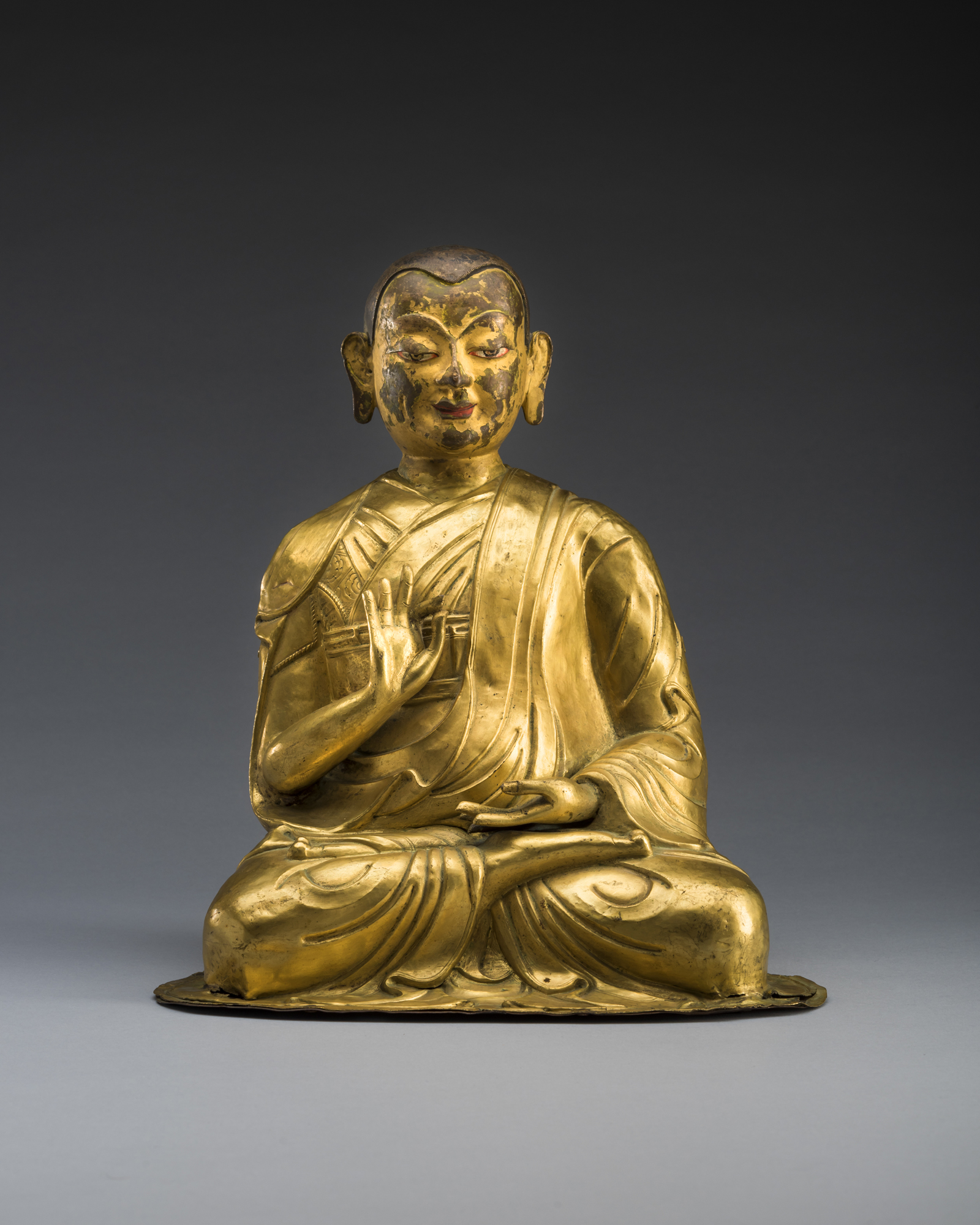 A Gilt Bronze Figure of a Buddhist Lama Tibet 18th Century