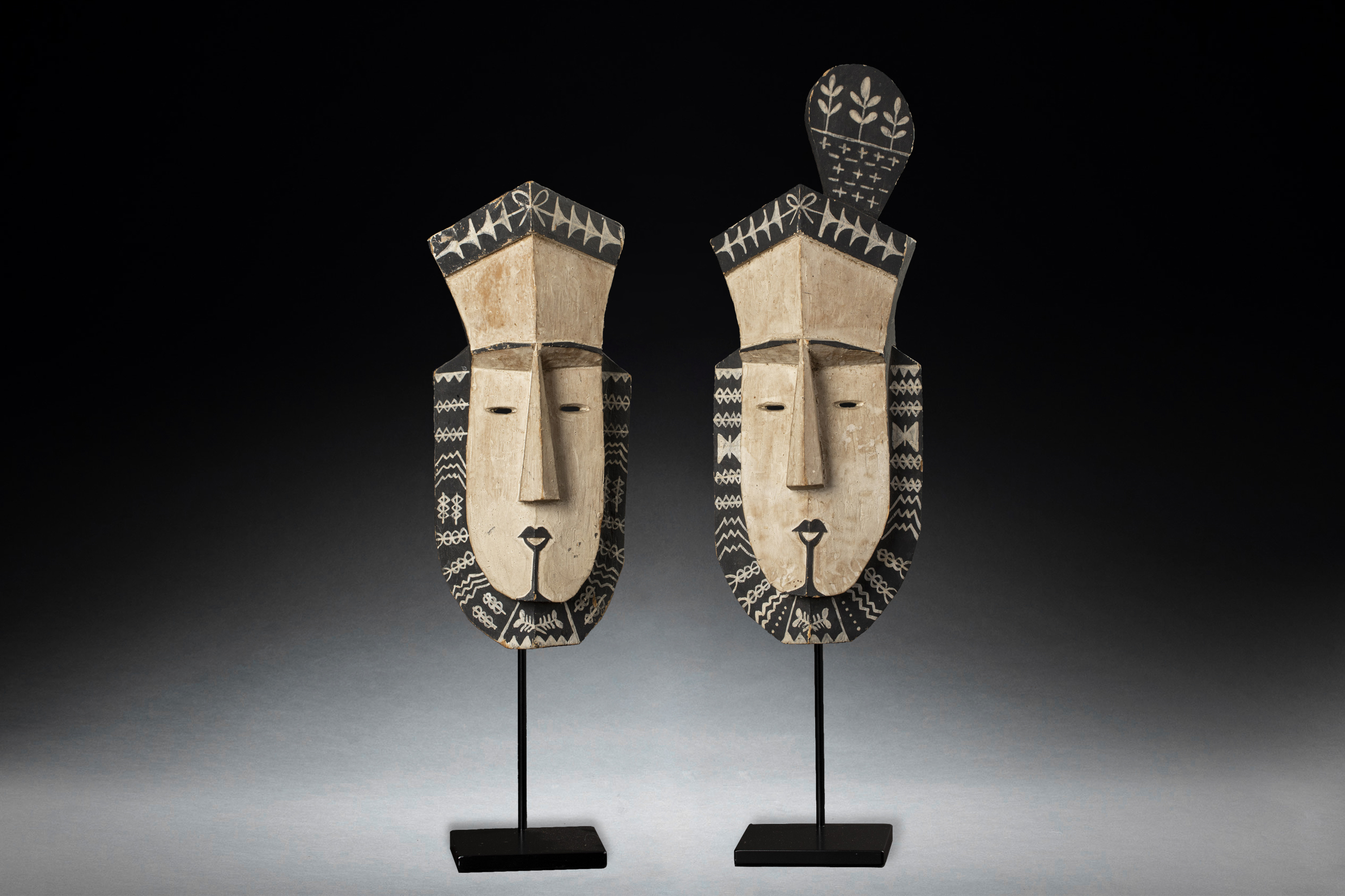 A Fine Old Pair of Mortlock Islands Tapuana Masks from Micronesia