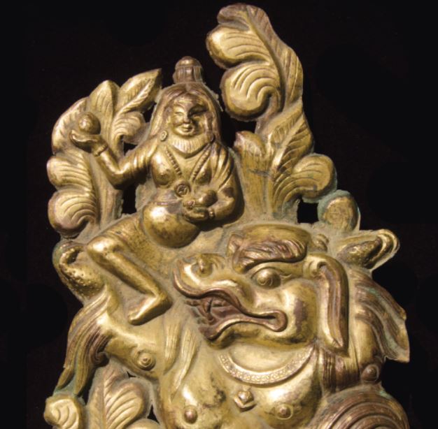 A Fine Gilt Bronze Repousse of a Buddhist Saint Riding a Tiger Tibet 18th Century