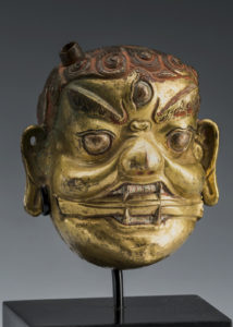 A Fine Old Mongolian Bronze Repousse Head of a Wrathful Deity Mongolia 18th Century