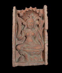 A Fine Early Clay Votive Temple Tile depicting the Deity Manasa West Bengal India 13th-16th C