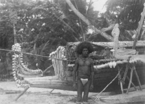 Milne Bay Man with his Kula Canoe & Canoe Ornaments