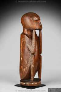 A Fine Old New Guinea Massim Ancestor Figure from Milne Bay Province Eastern Papua New Guinea