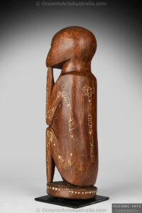 A Fine Old New Guinea Massim Ancestor Figure from Milne Bay Province Eastern Papua New Guinea