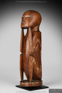 A Fine Old New Guinea Massim Ancestor Figure from Milne Bay Province Eastern Papua New Guinea