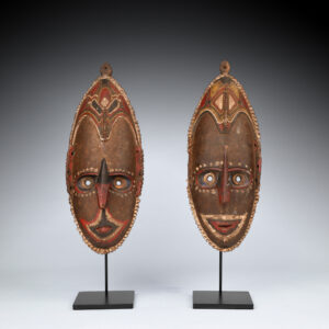 An Original Pair of Fine Old New Guinea Male & Female Brag Masks Coastal Sepik Area East Sepik Province in Papua New Guinea