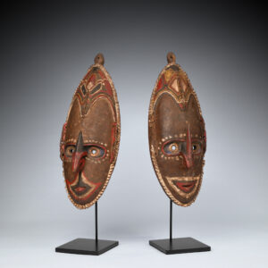 An Original Pair of Fine Old New Guinea Male & Female Brag Masks Coastal Sepik Area East Sepik Province in Papua New Guinea