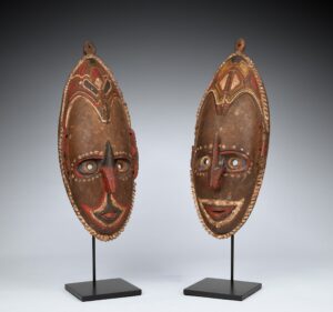 An Original Pair of Fine Old New Guinea Male & Female Brag Masks Coastal Sepik Area East Sepik Province in Papua New Guinea