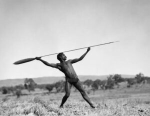 Australian Aboriginal Man using a Woomera